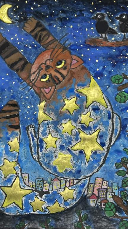 夜空を飛ぶ星柄の猫